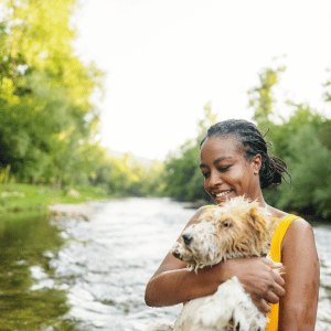 atlanta dog mom and her dog by a body of water