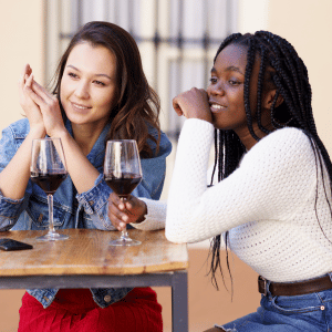 two Atlanta women having wine together